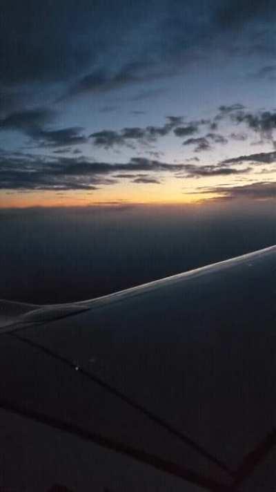 Descending from sunrise into fog.