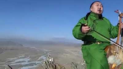Mongolian throat singing with a traditional instrument