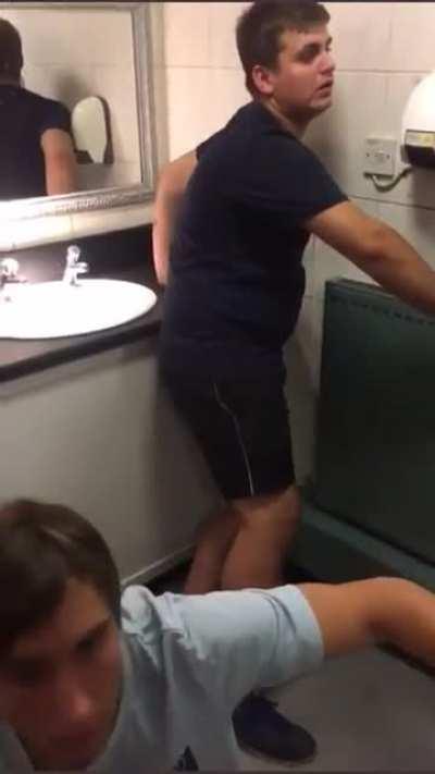 Two blokes take far too much in the pub toilet