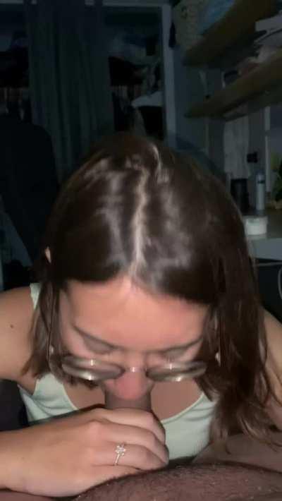 Half Asian in glasses likes to use her tongue