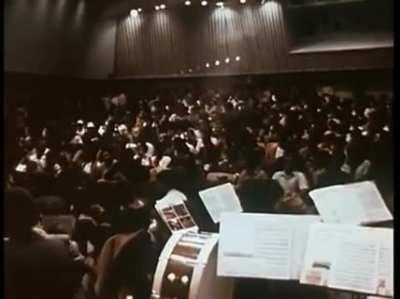 A woman asks Muhammad Ali if he would say he's the greatest.