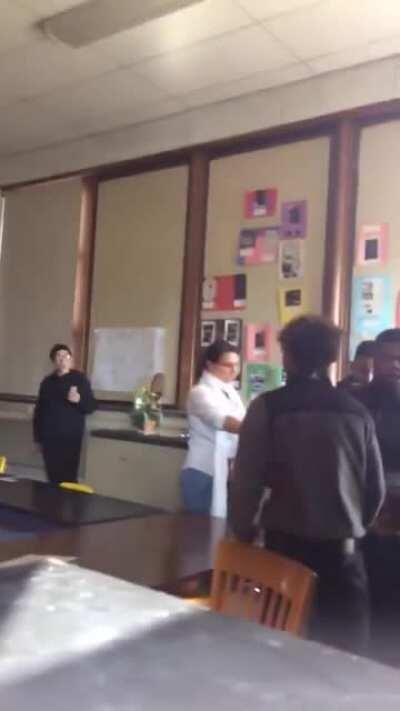 Student knocks out kid who hit teacher during a fight