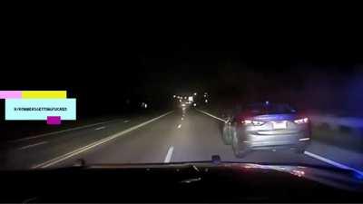 Robber who carjacked someone gets chased by police. He tries to bail from the car while it's moving in an attempt to trick the cop into continuing the chase without him in it.