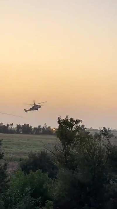Czech Mi-24V attack helicopter, which is in service with the Ukrainian Air Force, strikes Russian positions with unguided S-13 rockets 