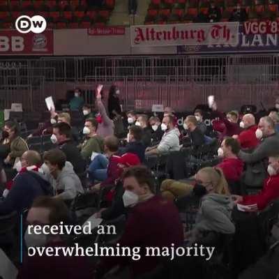 Bayern's General Assembly descending into chaos over the Qatar Airways sponsorship. The fans chant 
