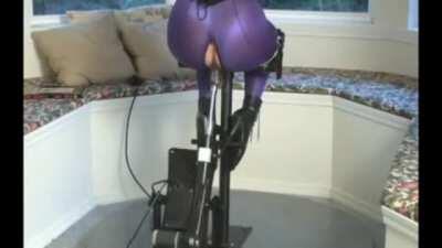 She can only squirm and squeeze her thighs together. There is no escape. The machine will not stop.