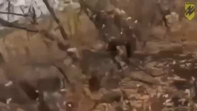 A russian soldier is shot at close range.