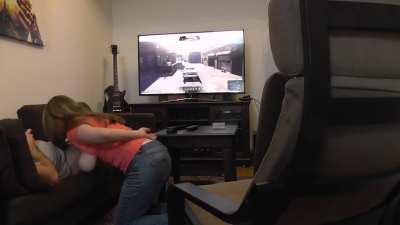 Sucking her BF while he plays Xbox