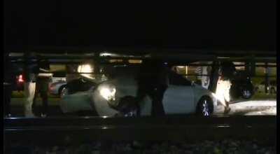 Car Stuck on Tracks Hit by Cargo Train