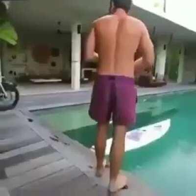 Trying to tow a surfer through a pool