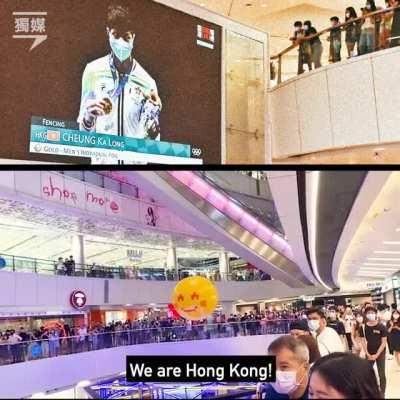 Large crowd in Hong Kong mall boos the anthem of Chinese occupiers during the medal ceremony of HK's first gold