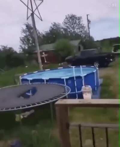 jumping off the roof to get in the pool