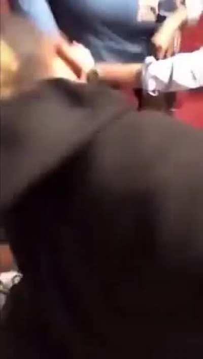 girl gets beaten by an angry mob