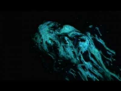 Jennifer Dark glows under black light