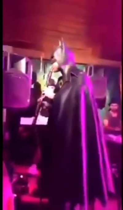 Batman playing Clarinet