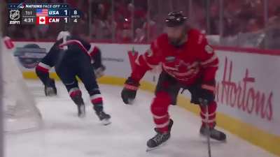 Brady Tkachuk slams Daughty into the boards