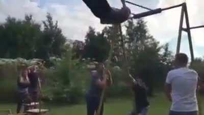 messing around on a kids swing