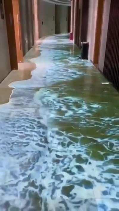 Just a holographic projection floor in a Chinese hotel... This floor is the new fashion.........