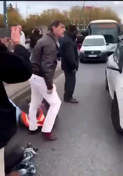 French guy throws around climate protesters blocking the street
