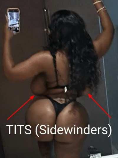 Tits so big you can see them from behind.