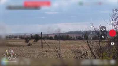 A drone captures footage of a Russian Mi-8 helicopter performing an emergency landing after being hit by a Ukrainian FPV drone