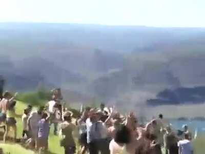 Guy dancing on his own starts a dance party.