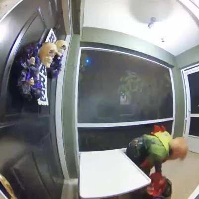 Kid steals candy and flips off the camera.