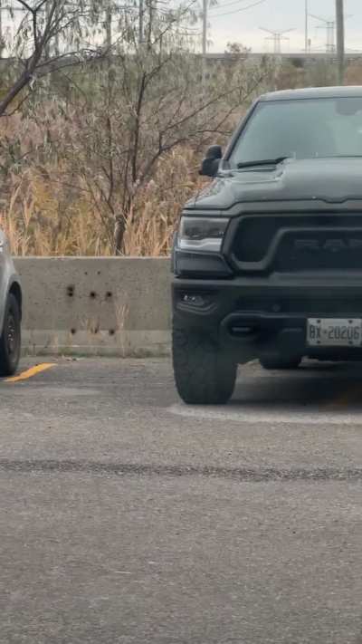 Not a single space available in the GO parking lot at rush hour but this entitled truck driver feels the need to take up 2 spaces