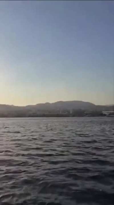 An angle recording the Yemeni drone strike in EIlat, Southern Israel, from a boat - Wednesday 24th September 2025