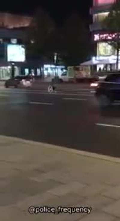 Wheelchair dude crossing the road.