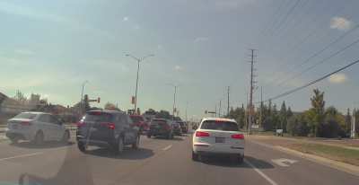 Daytime red light runner and no noticeable license plate.