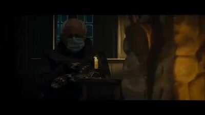 That man in the corner, who is he?