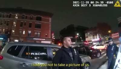 NYPD pig breaks mans phone for filming him (filming the police is constitutionally protected).