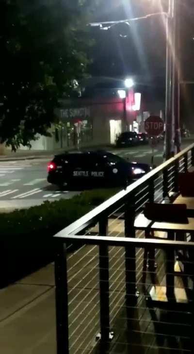 Naked girl does not mind police watching