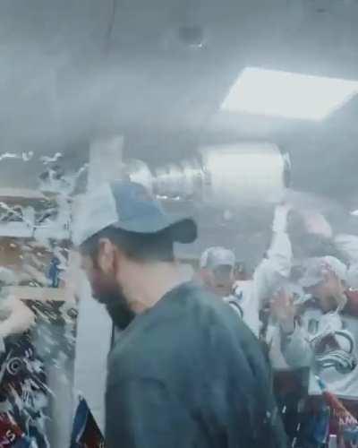 Footage of the locker room celebration the moment the cup is brought in. From @NHL