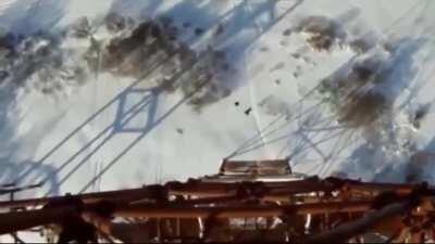 Base jumper's 120-metre 'death' plunge after parachute fails to open... but SURVIVES