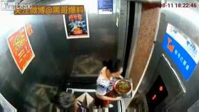Woman ducks out of a moving elevator