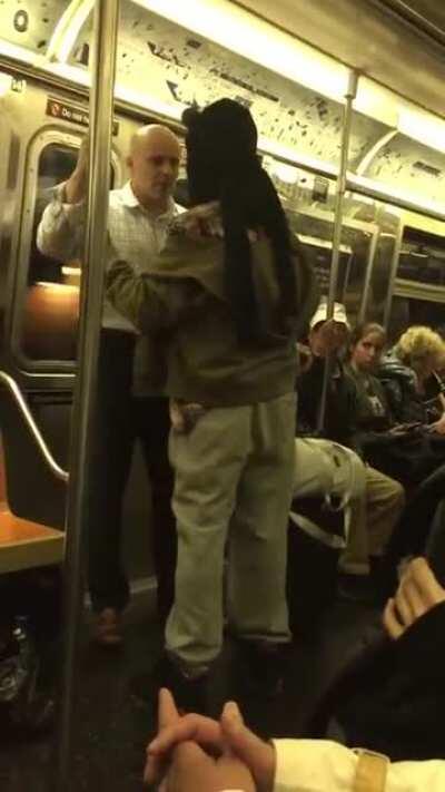 Guy remains unfazed, and keeps his composure against a man harassing and threatening him.