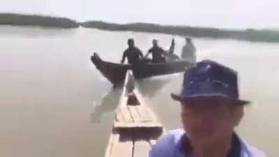 WCGW taking selfie video in marsh