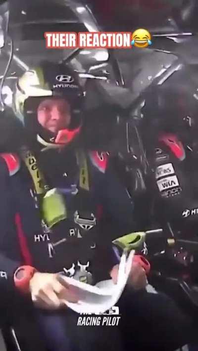Race car drivers reaction to their crash.