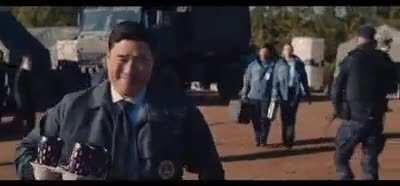 Look at how happy this man is to be bringing coffee to his friends