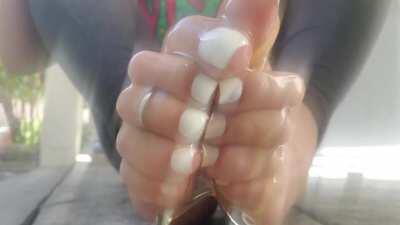 Oiling up my perfect white pedi