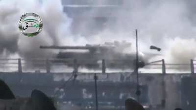 Syrian Army tank operating on the Southern Ring Road in Damascus eats an anti-tank strike to the rear - 3/13/2013