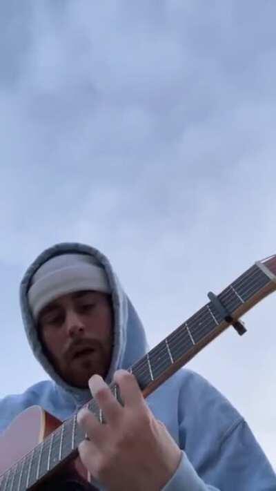 A bird passes by in the exact moment Sam Tompkins sings the word 