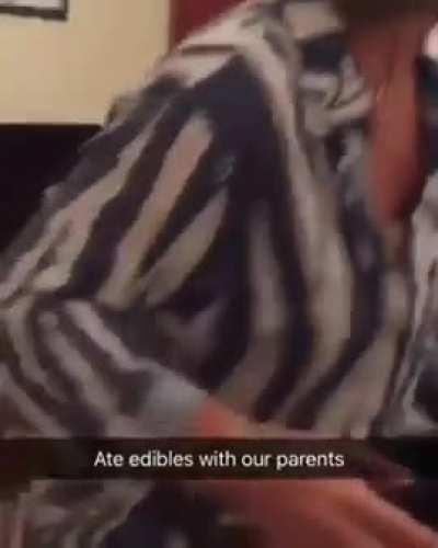 mom seems embarrassed but dad is loving it.