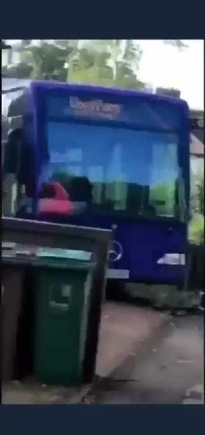 Bus crashed into front gardens, somehow?! (Flowery language)