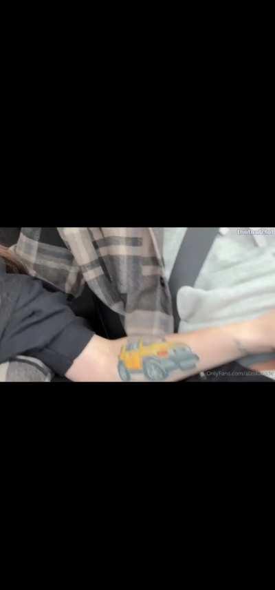 Lesbian giving her friend a handjob in a car