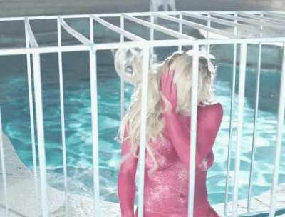 Britney Spears in red glitter body paint, 2016