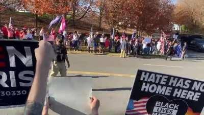 Trump motorcade being greeted by crowd as it returns from golf course