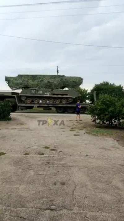 Funny forgotten soldier running after truck